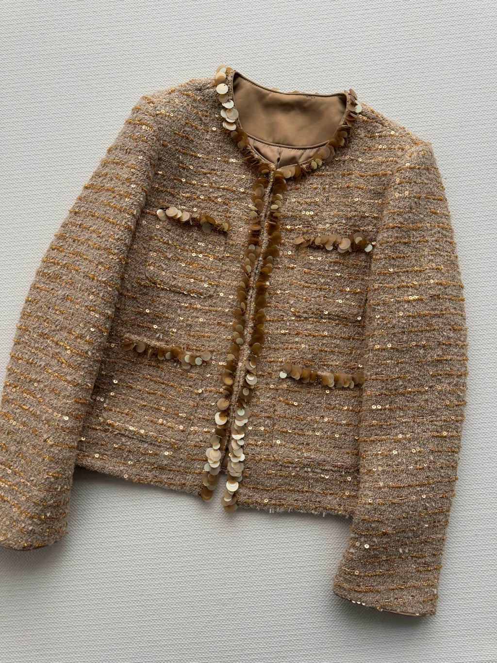 Gold sequined tweed Chanel-style jacket