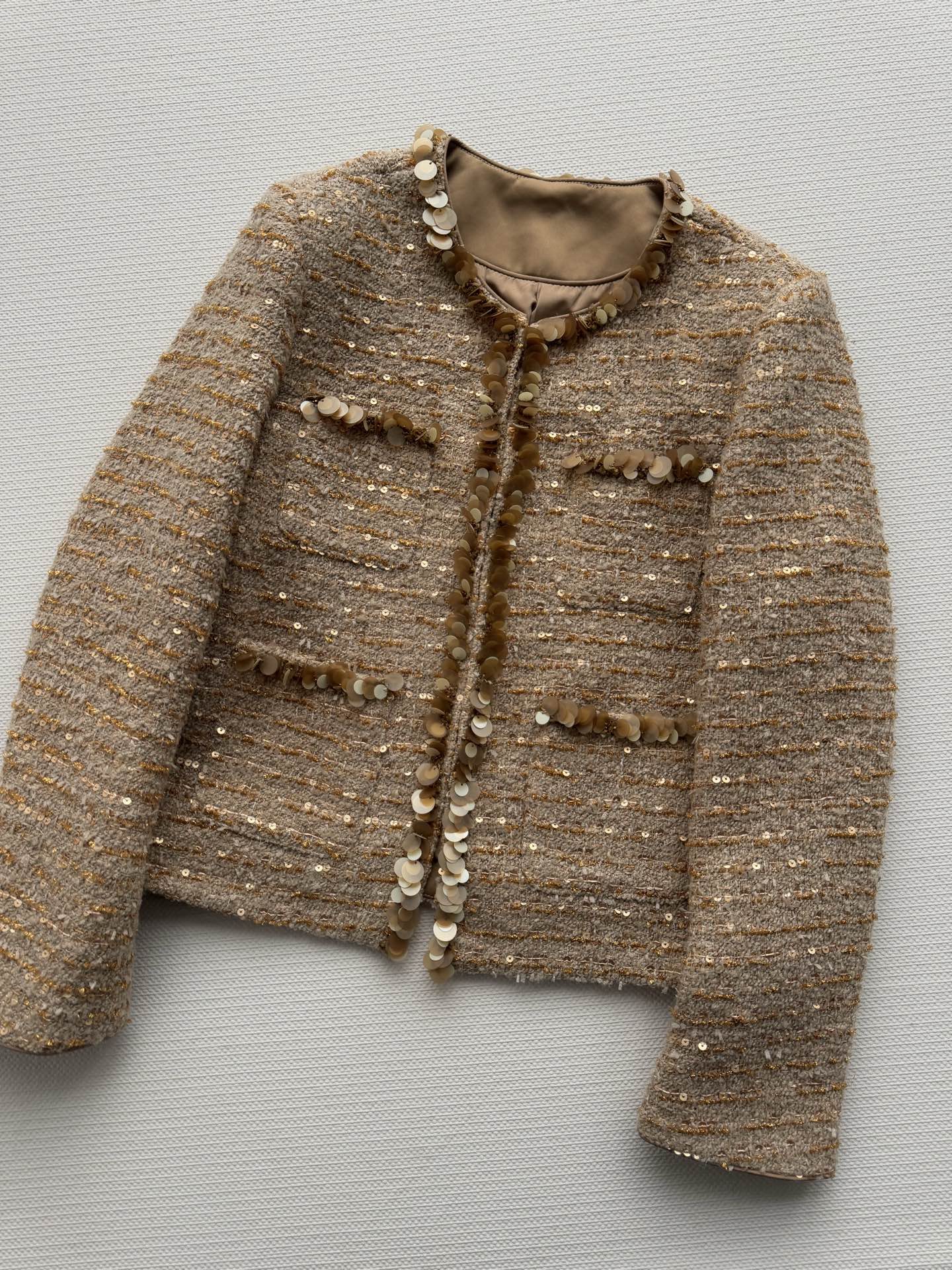 Gold sequined tweed Chanel-style jacket
