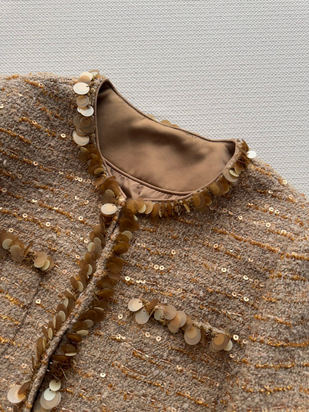 Gold sequined tweed Chanel-style jacket