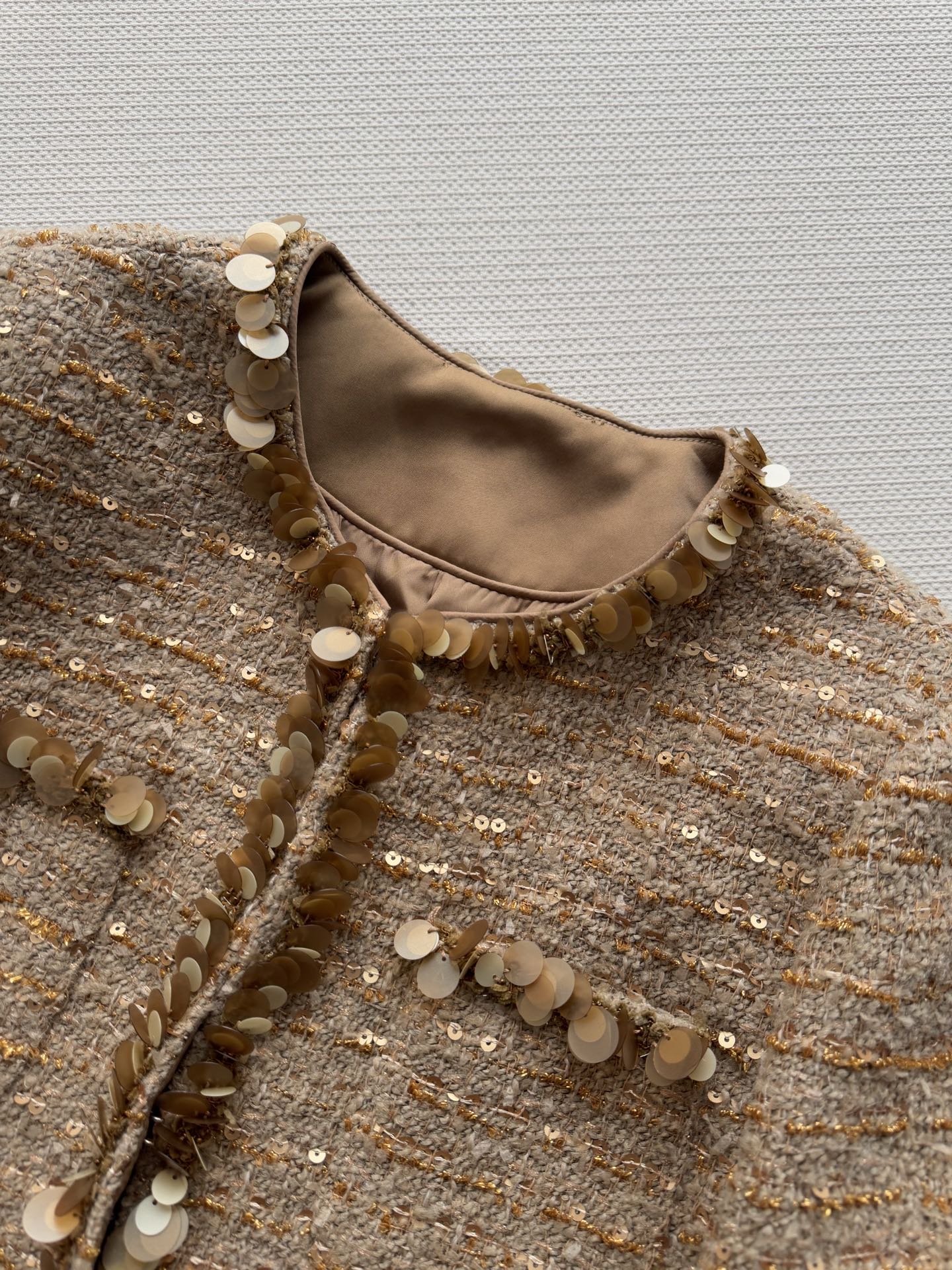 Gold sequined tweed Chanel-style jacket