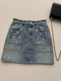 New sequined denim midi skirt