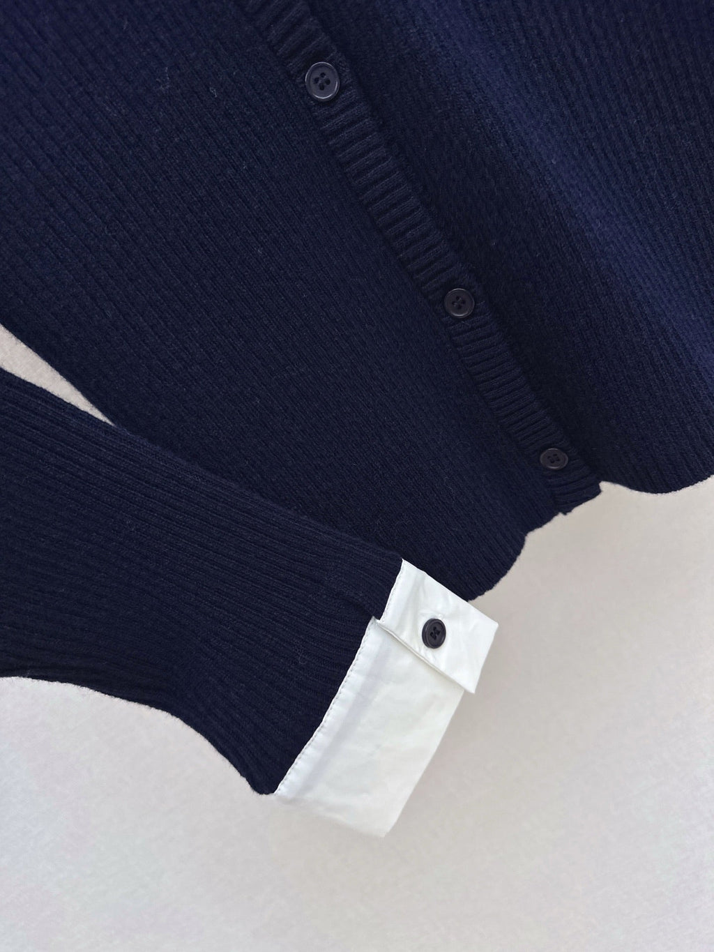 Latest design: Patchwork faux two-piece knit top