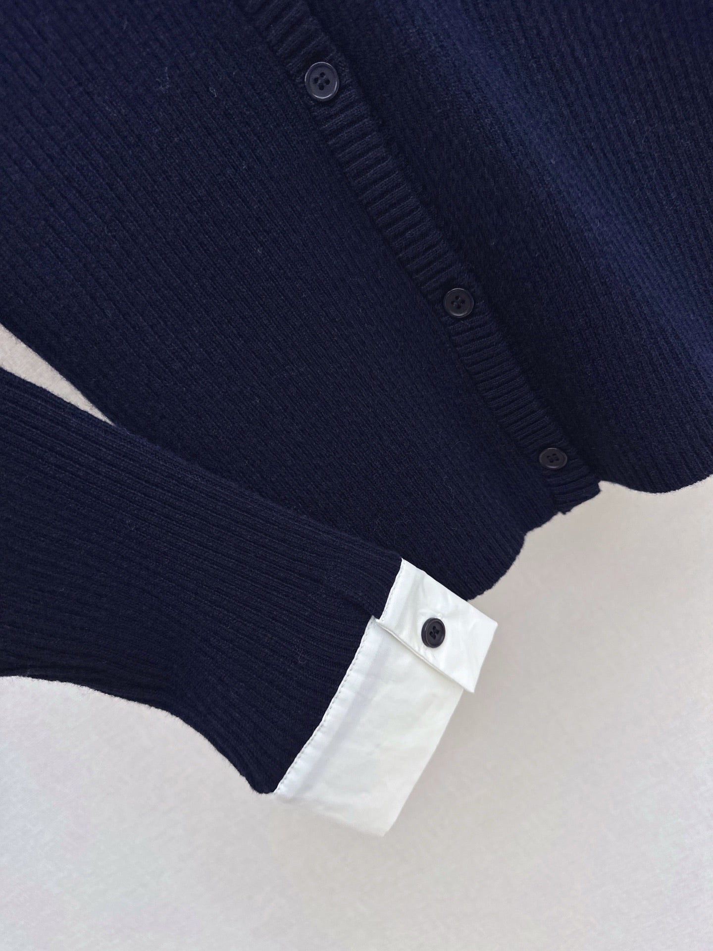 Latest design: Patchwork faux two-piece knit top