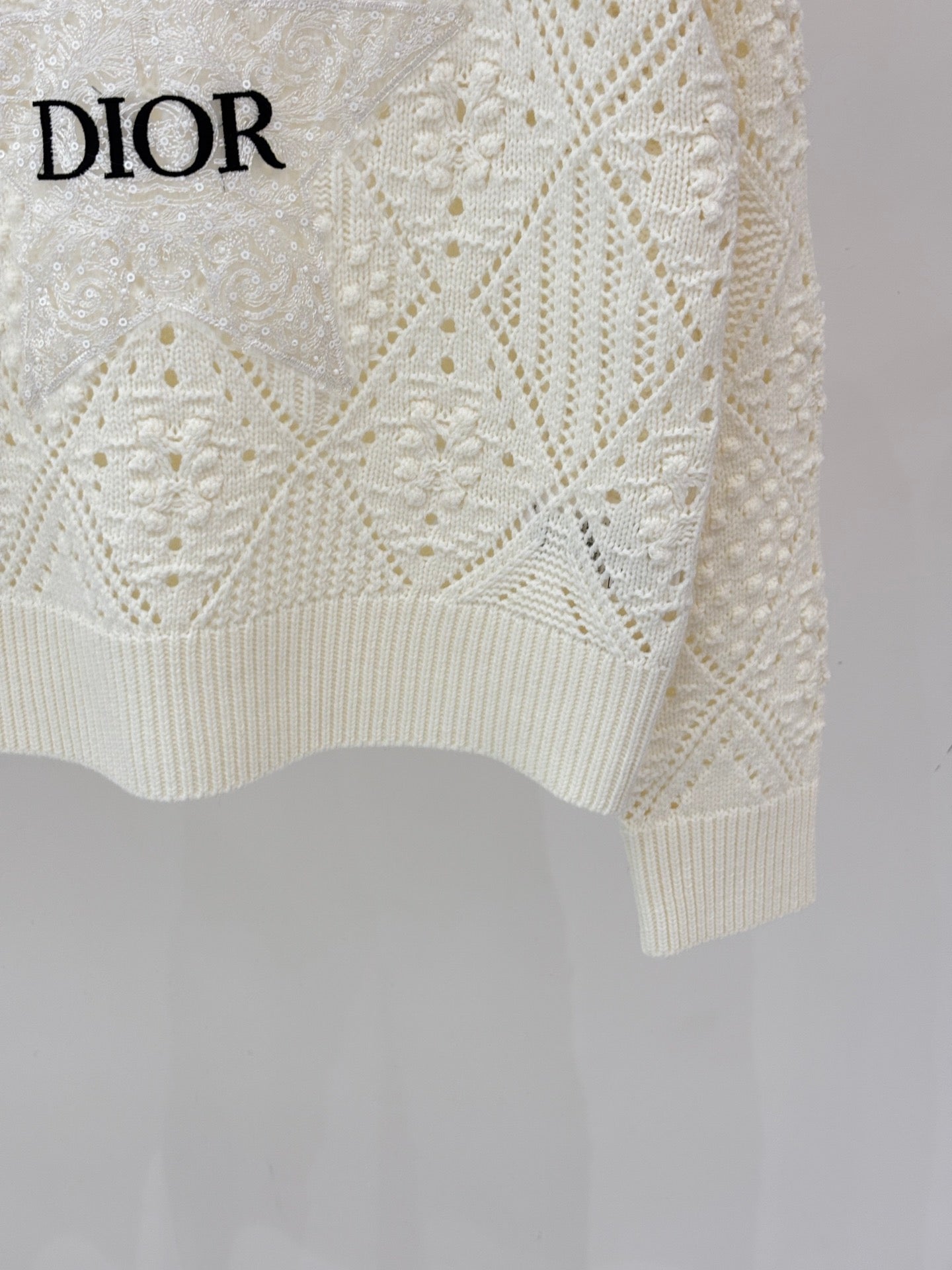 Embroidered jacquard knit long-sleeved top