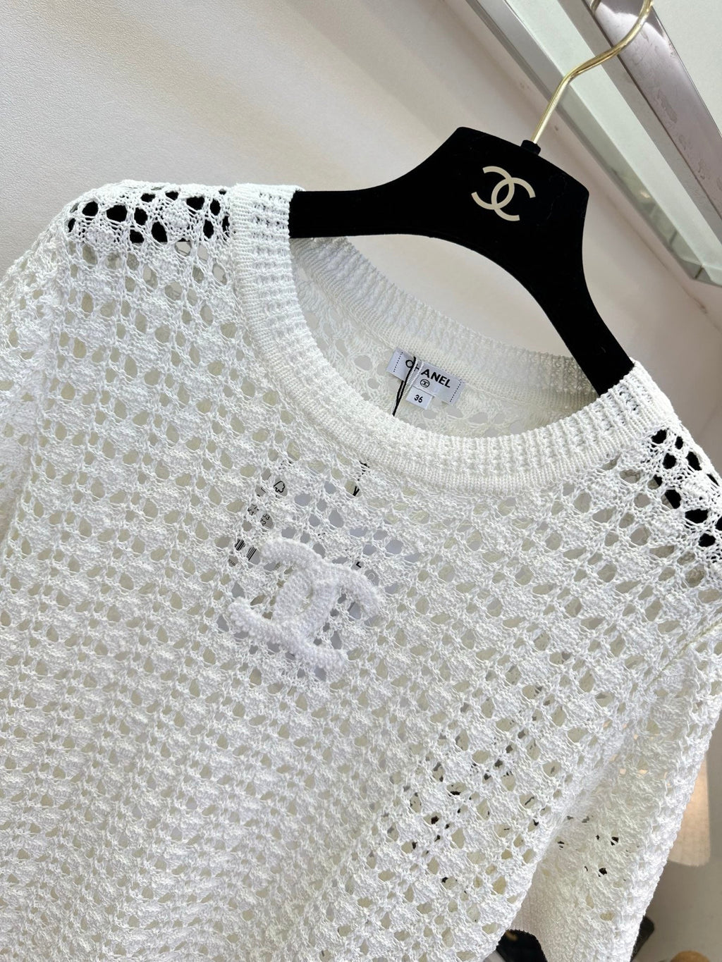 26NEW French-style openwork knit top