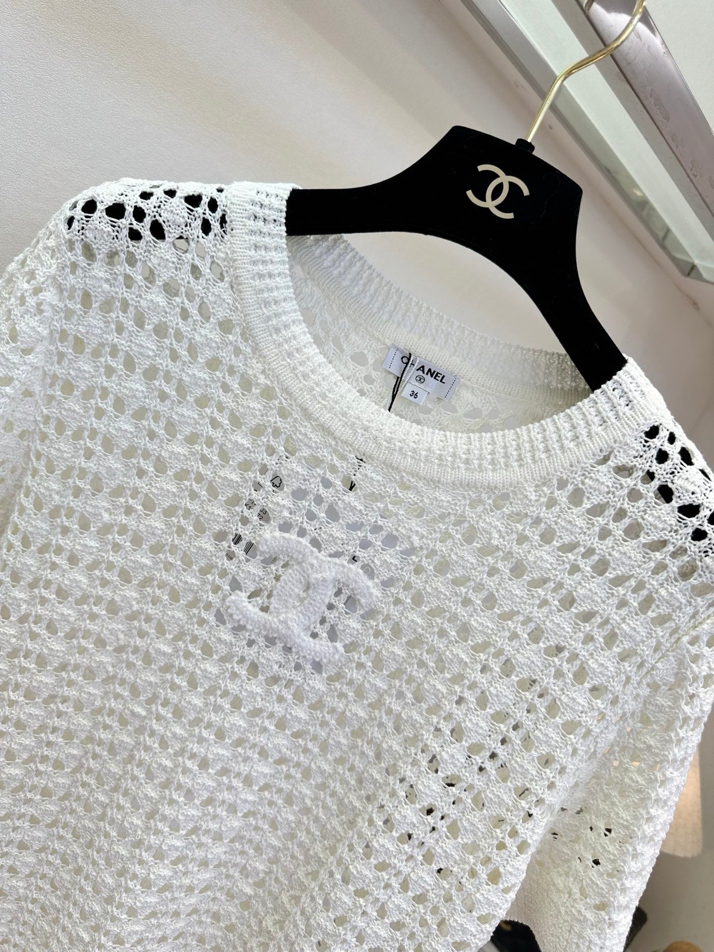 26NEW French-style openwork knit top