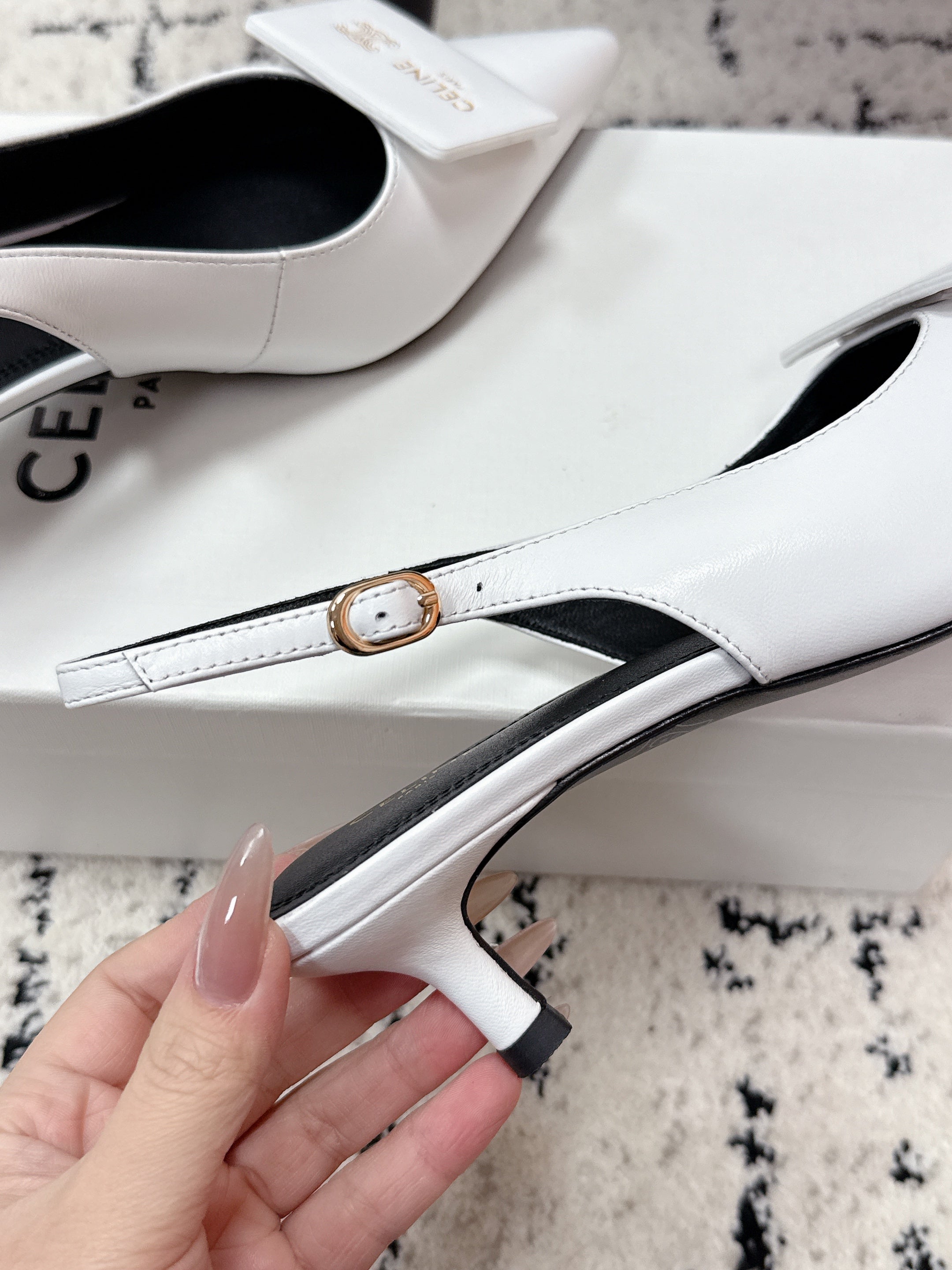 26NEW's signature open-toe buckle high heels
