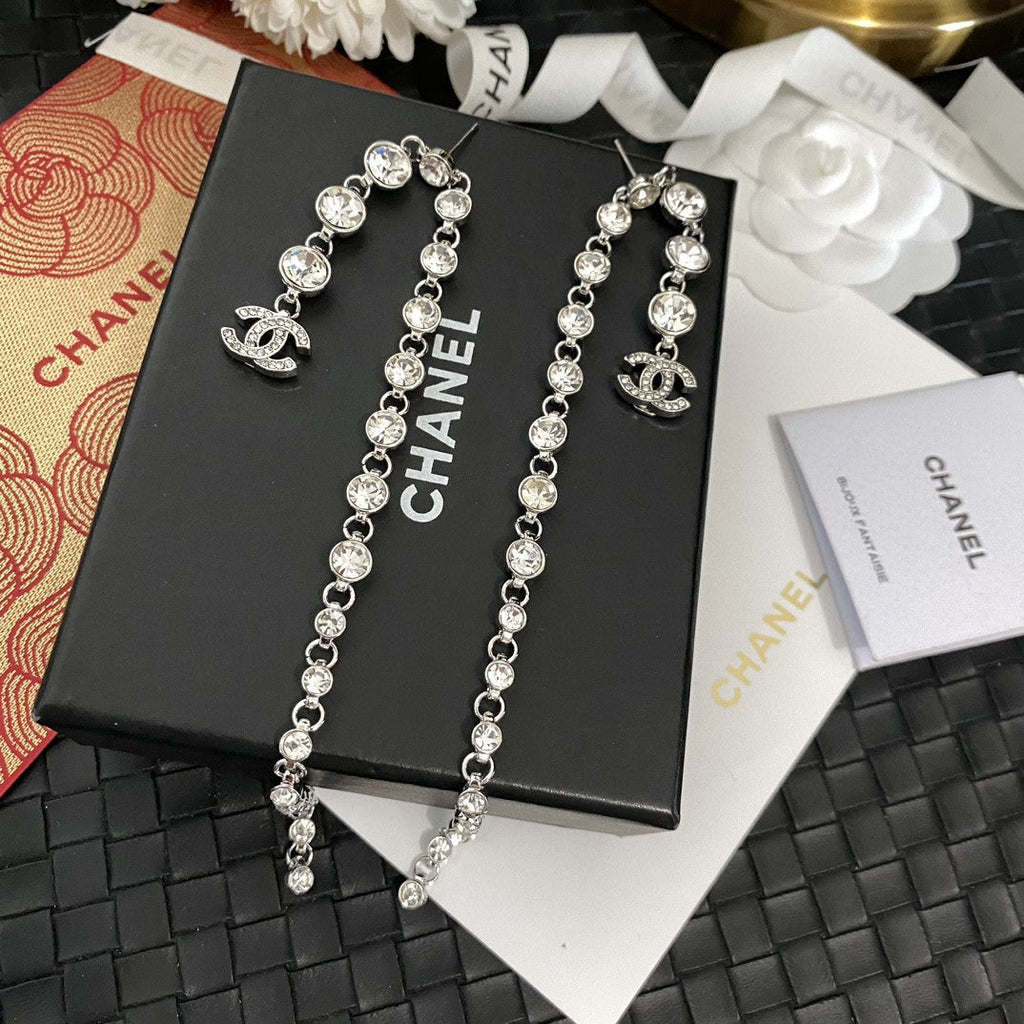 Silver round diamond long earrings