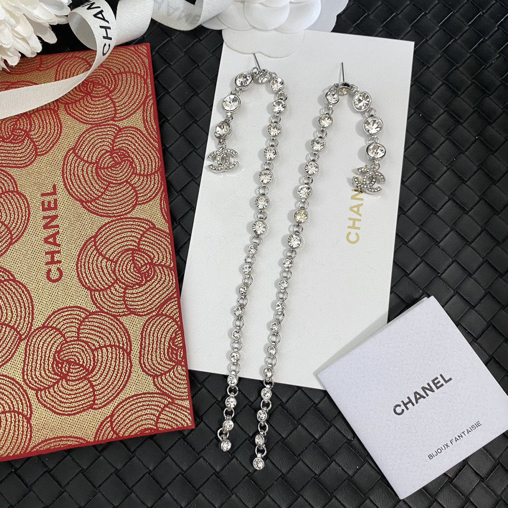 Silver round diamond long earrings