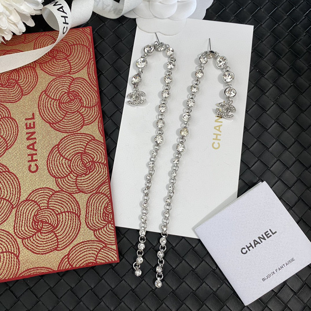 Silver round diamond long earrings