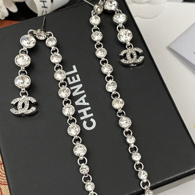 Silver round diamond long earrings
