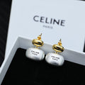 Two-tone pendant earrings