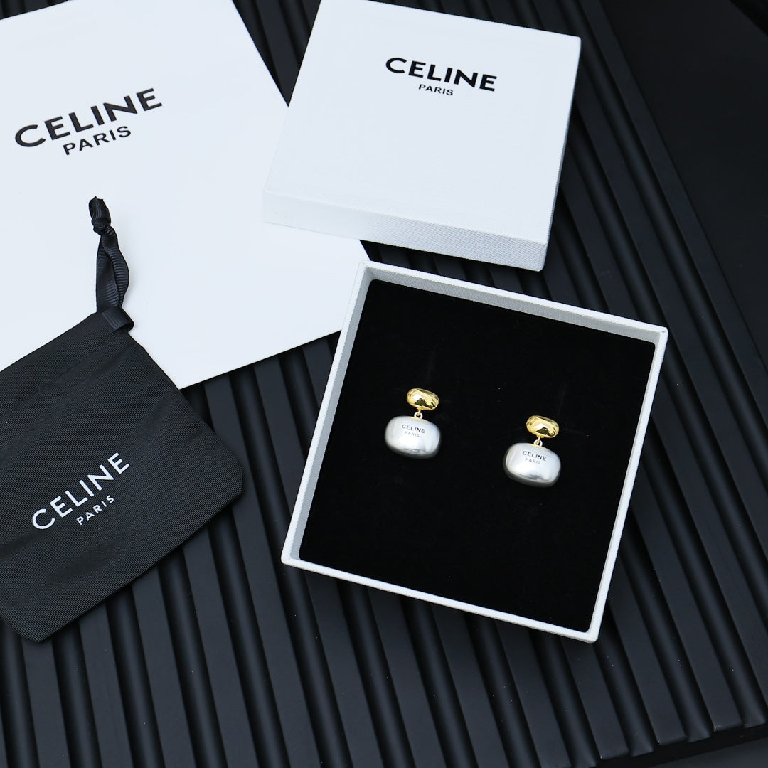 Two-tone pendant earrings