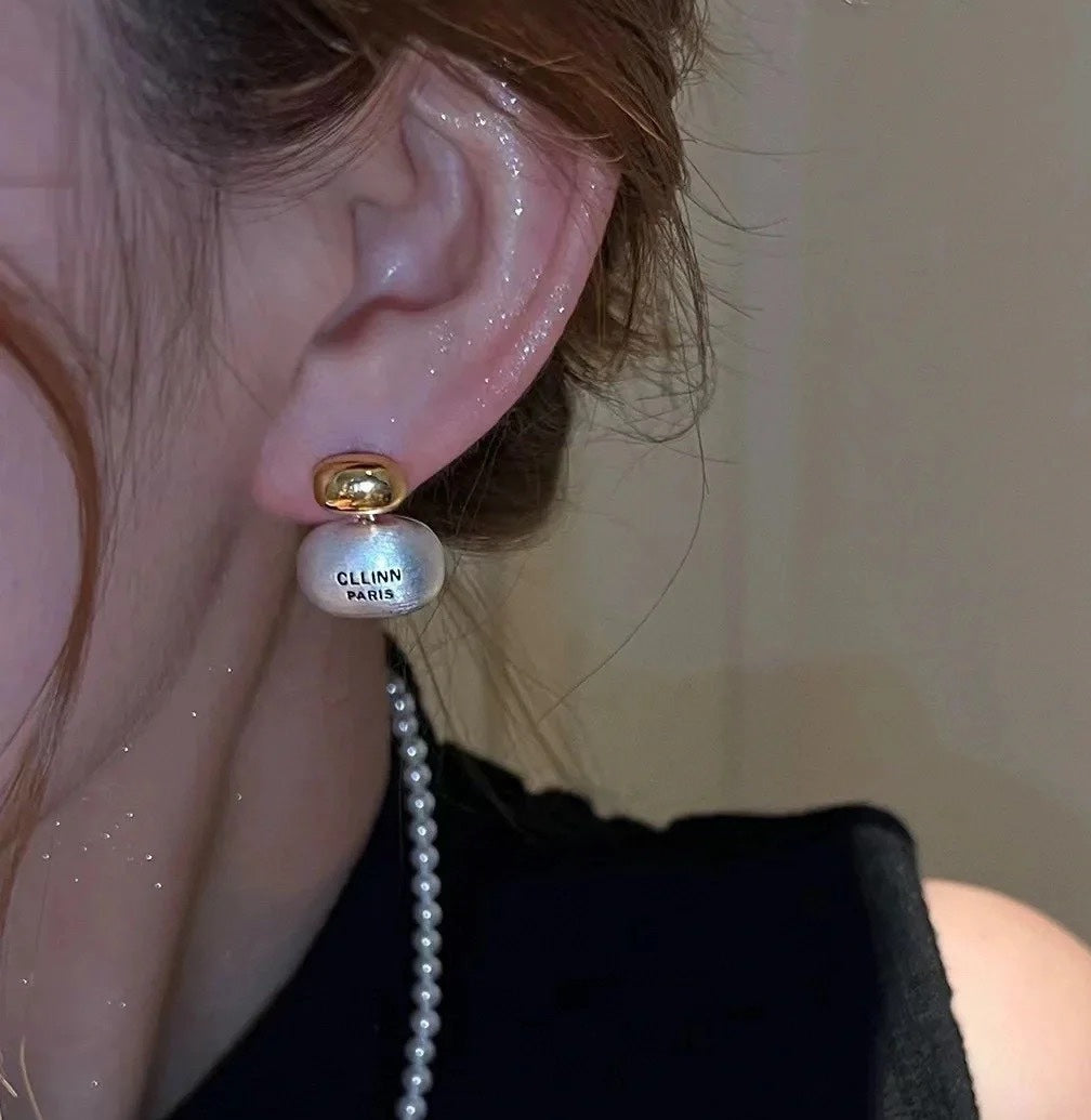 Two-tone pendant earrings