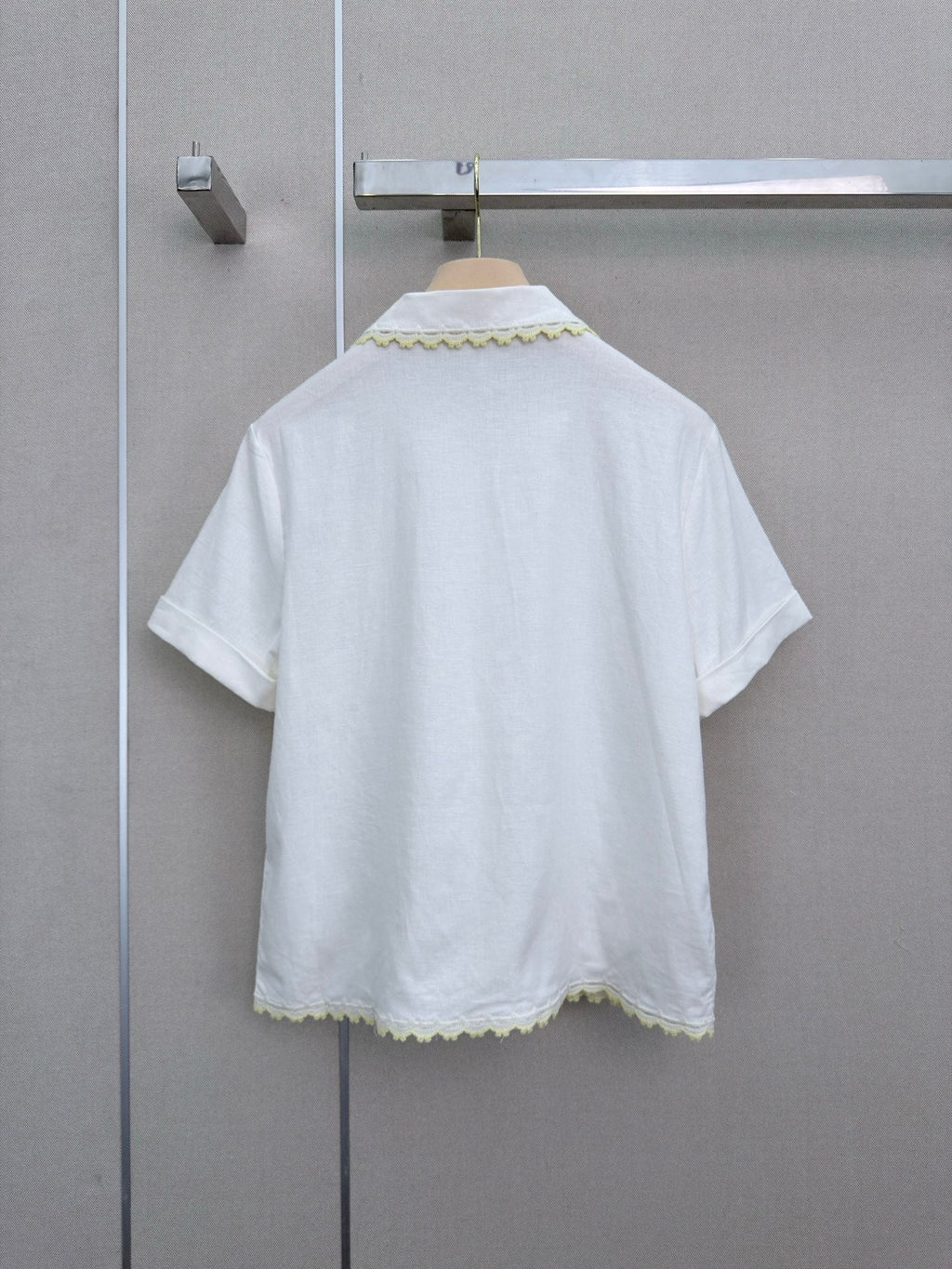 Lace-trimmed short white shirt