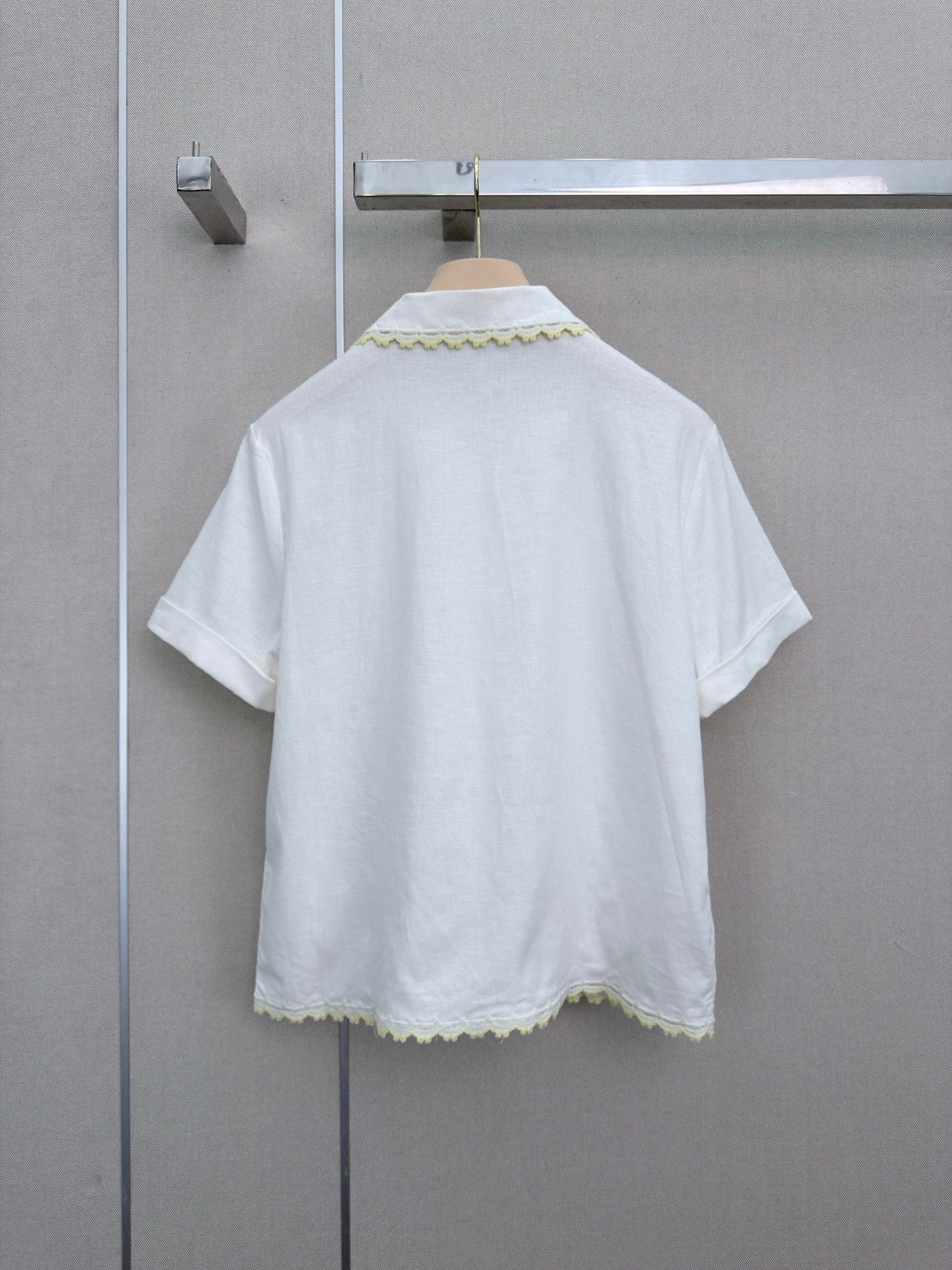Lace-trimmed short white shirt