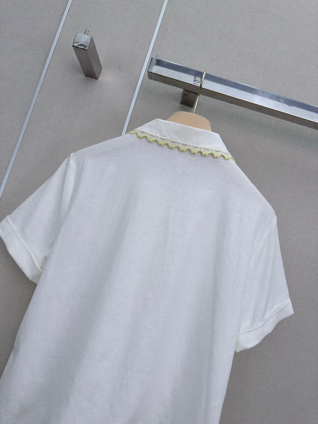 Lace-trimmed short white shirt