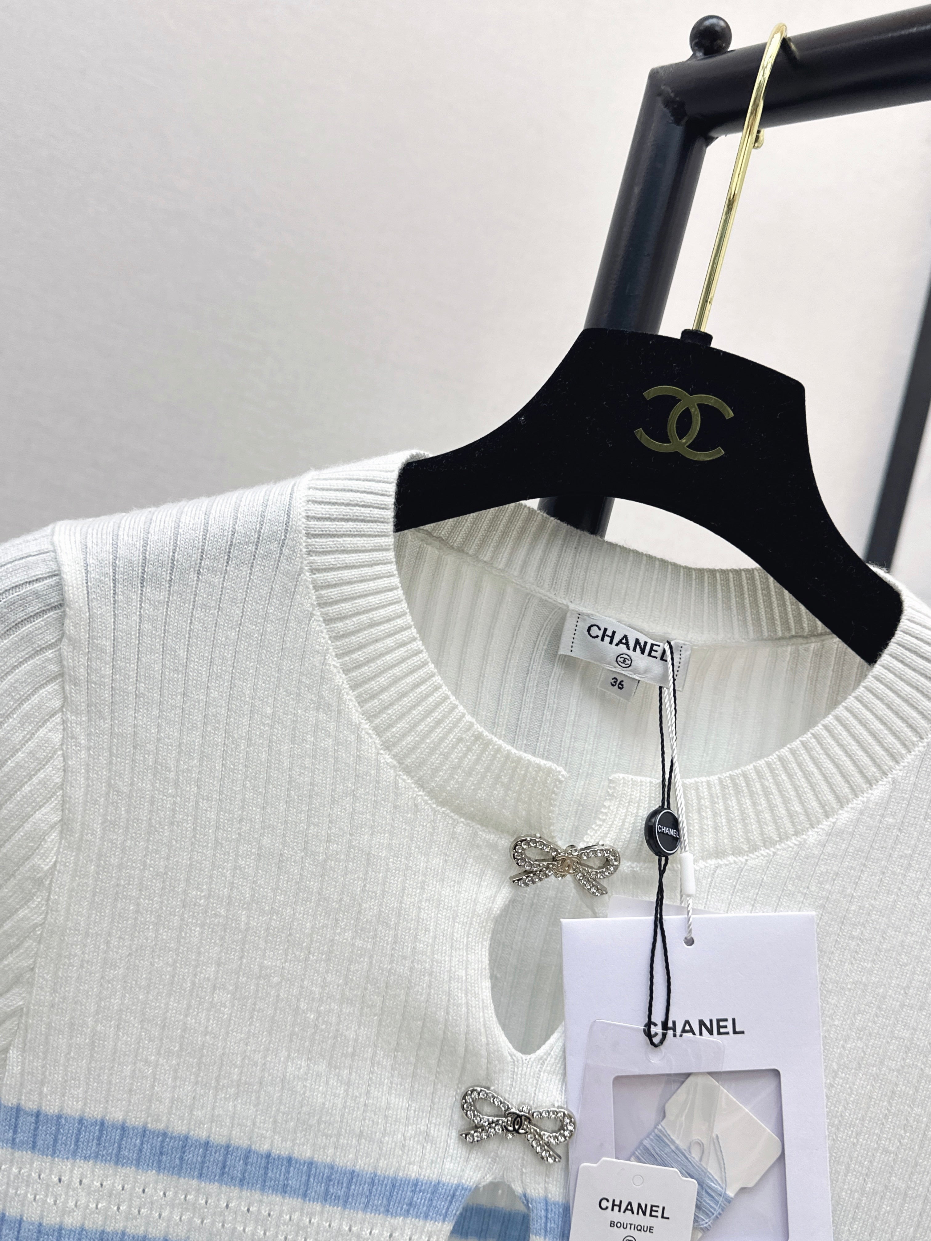 26SS - New striped knit top with bow embellishment
