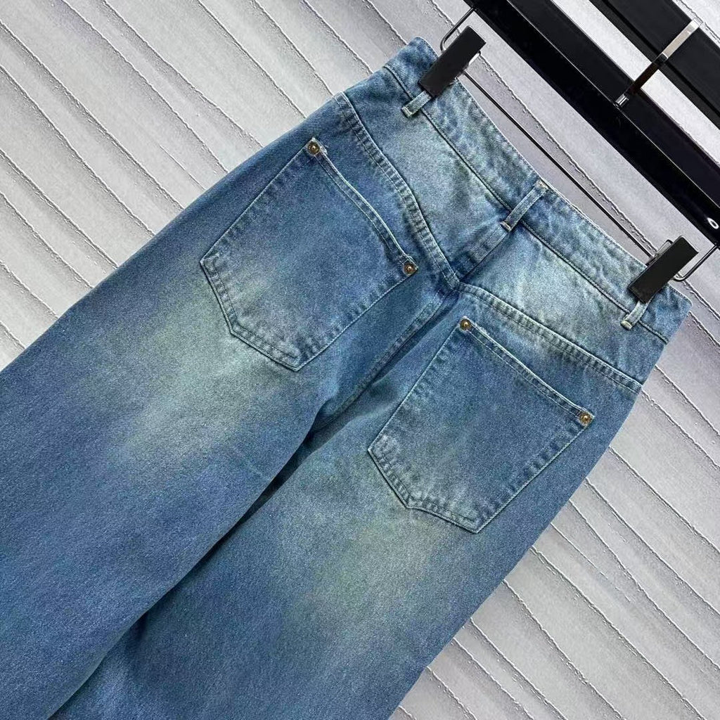 Leather brand denim trousers