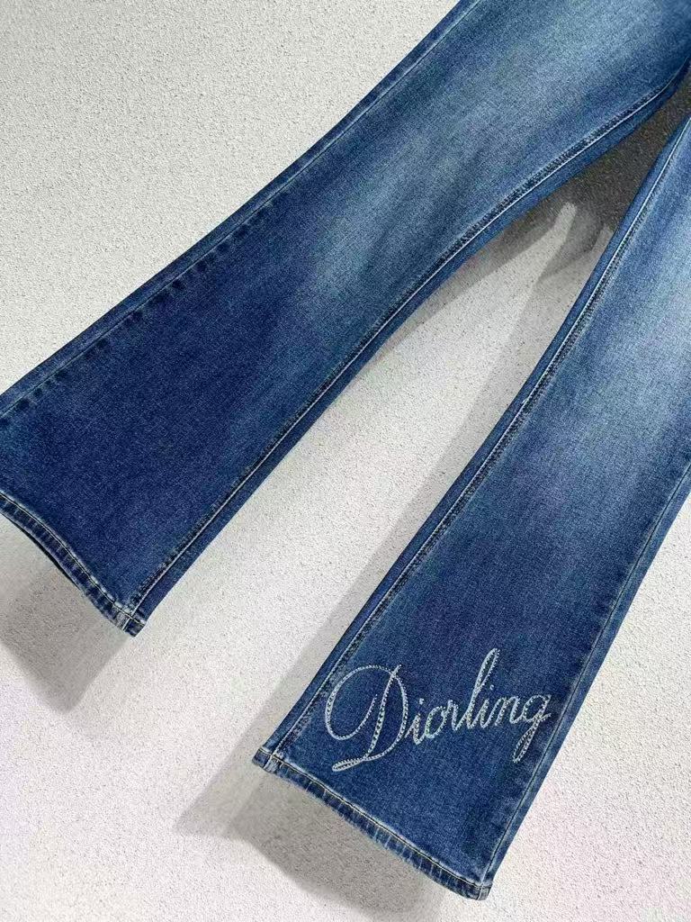Rhinestone-embellished, slightly flared denim trousers