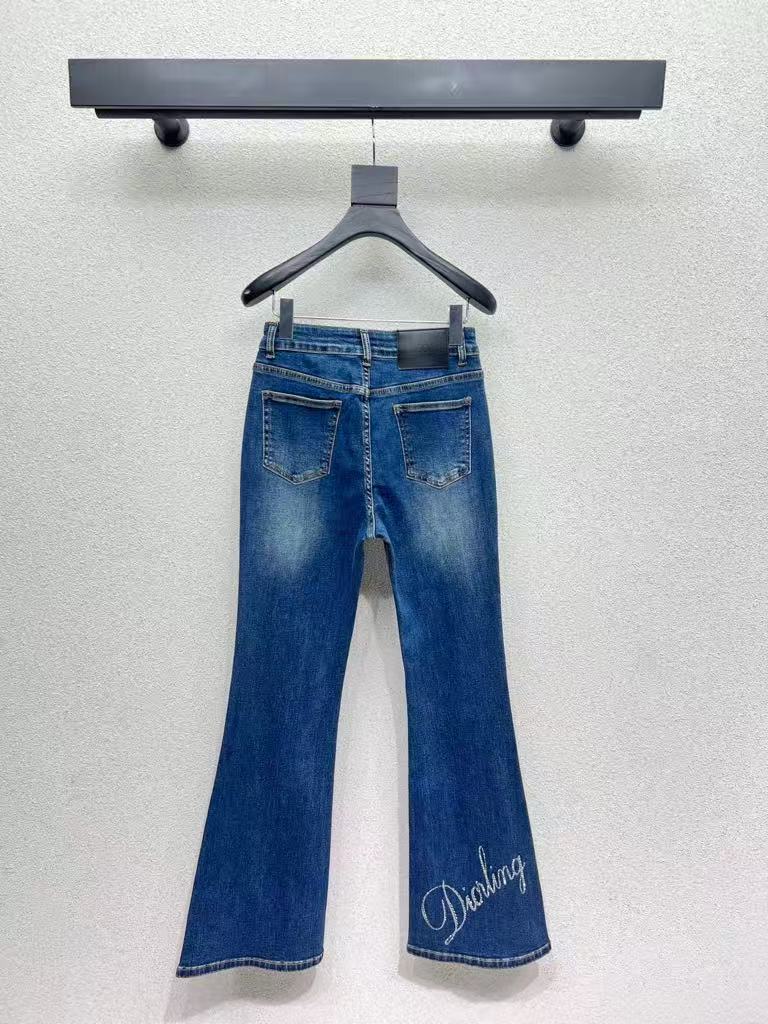 Rhinestone-embellished, slightly flared denim trousers