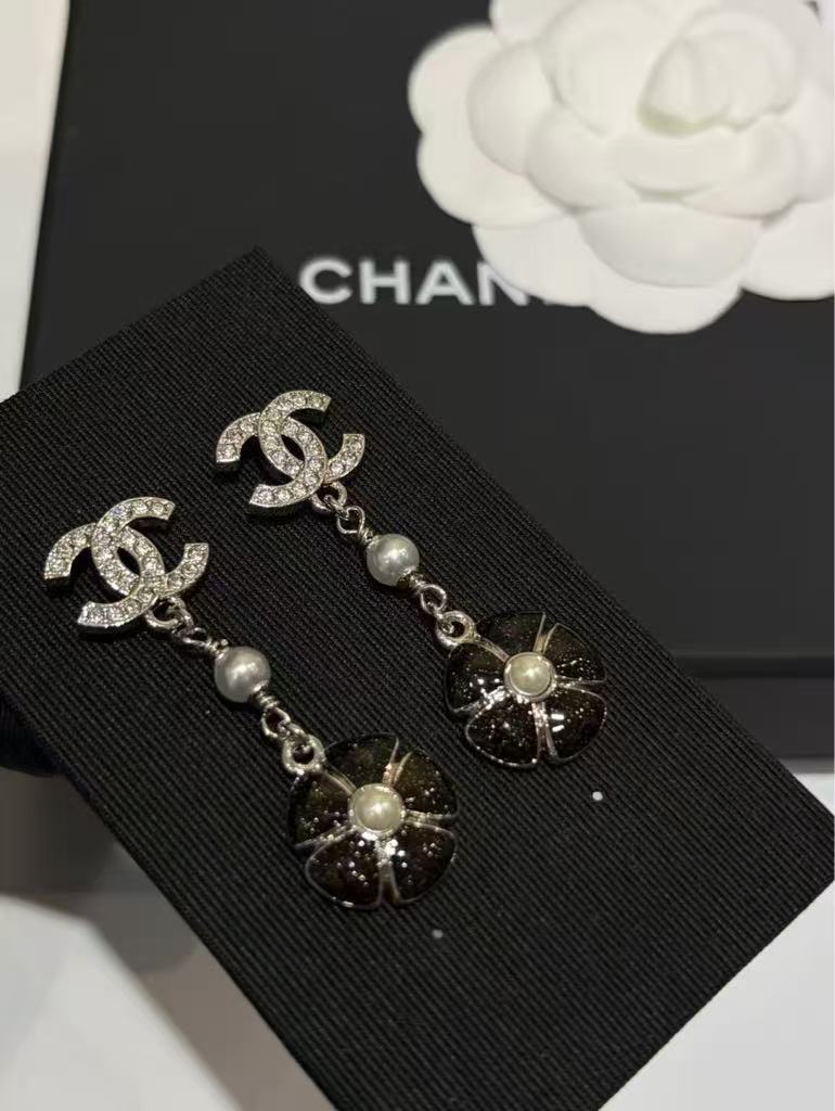 26C Early Spring Collection: Black enamel camellia flower silver stud earrings