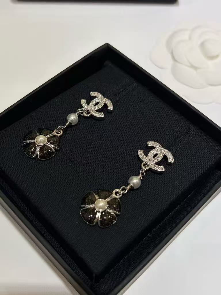 26C Early Spring Collection: Black enamel camellia flower silver stud earrings