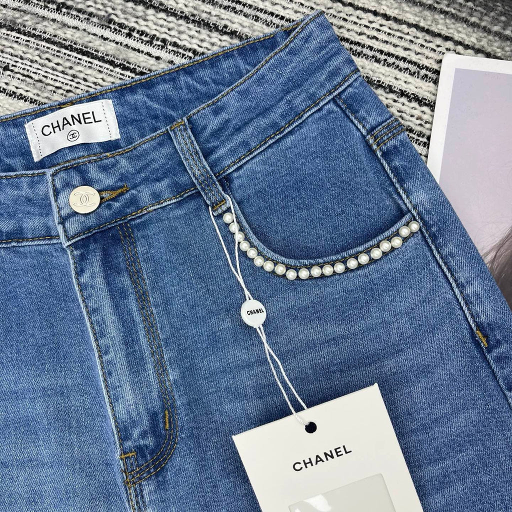 Spring 2026 Early Collection: New Straight-Leg Denim Jeans featuring Beaded Pockets, Embroidered Double-C Pocket Detail, and Washed Finish