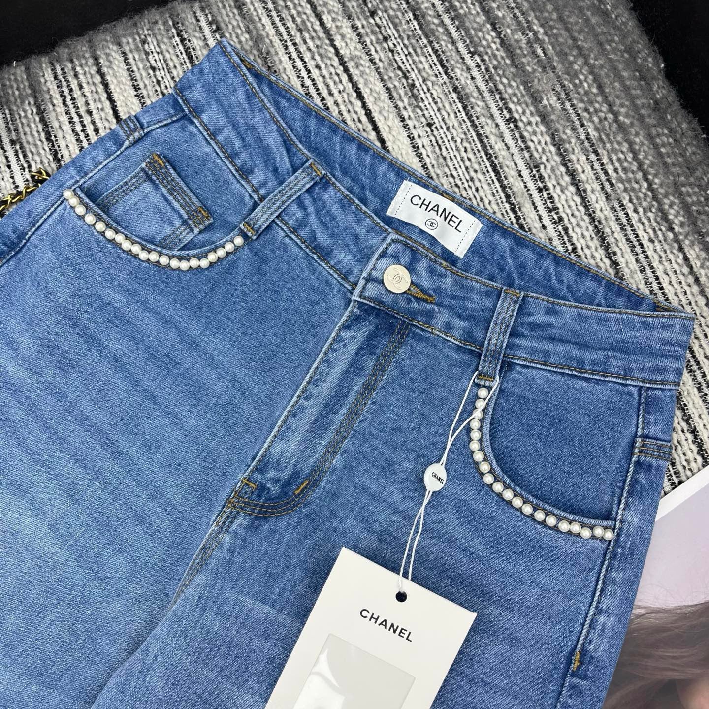 Spring 2026 Early Collection: New Straight-Leg Denim Jeans featuring Beaded Pockets, Embroidered Double-C Pocket Detail, and Washed Finish