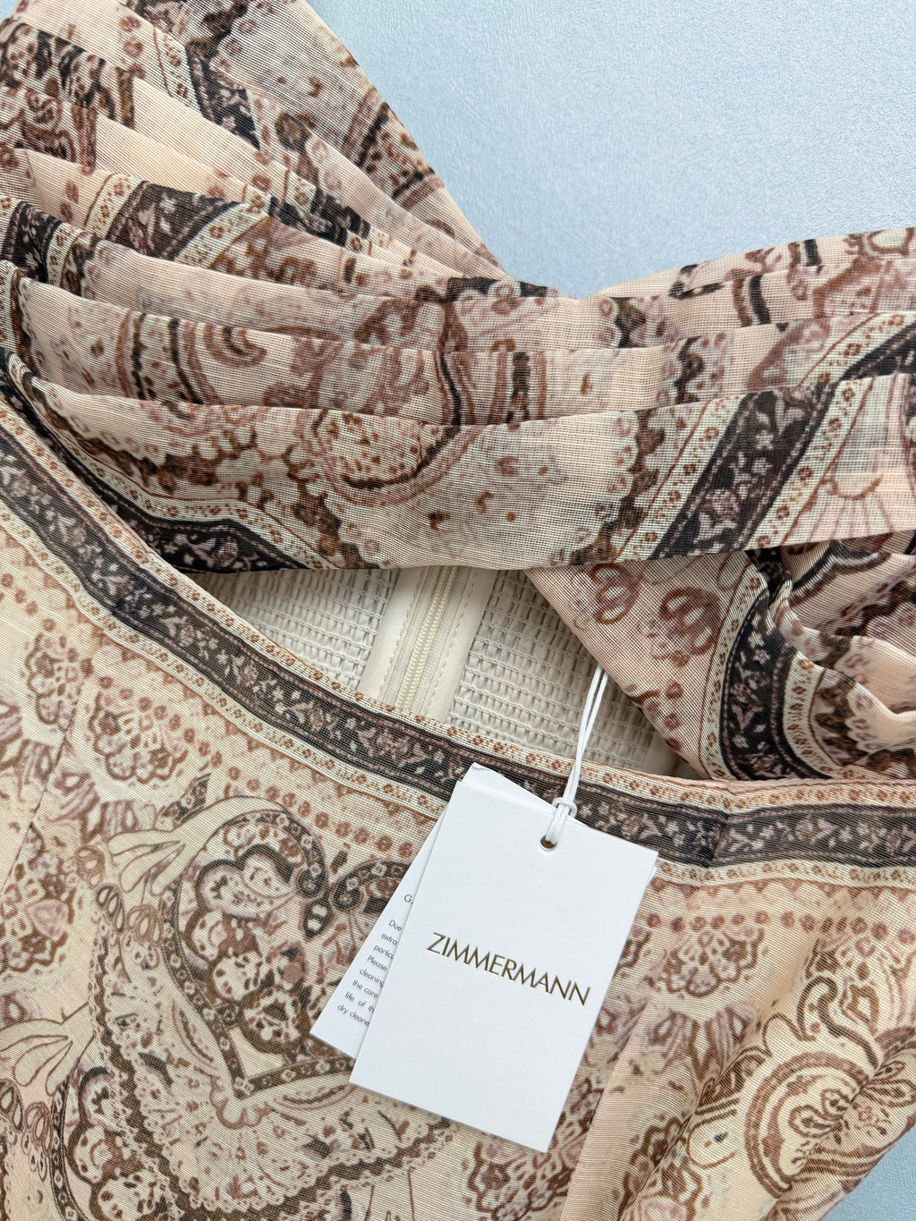 *26 New Arrival: Paisley-Print Strappy Dress — The combination of soft beige-apricot and paisley print creates a look that is both gentle and vintage.