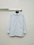Striped shirt from the Spring/Summer 2026 collection, featuring a blue and white vertical stripe design, fresh and simple.