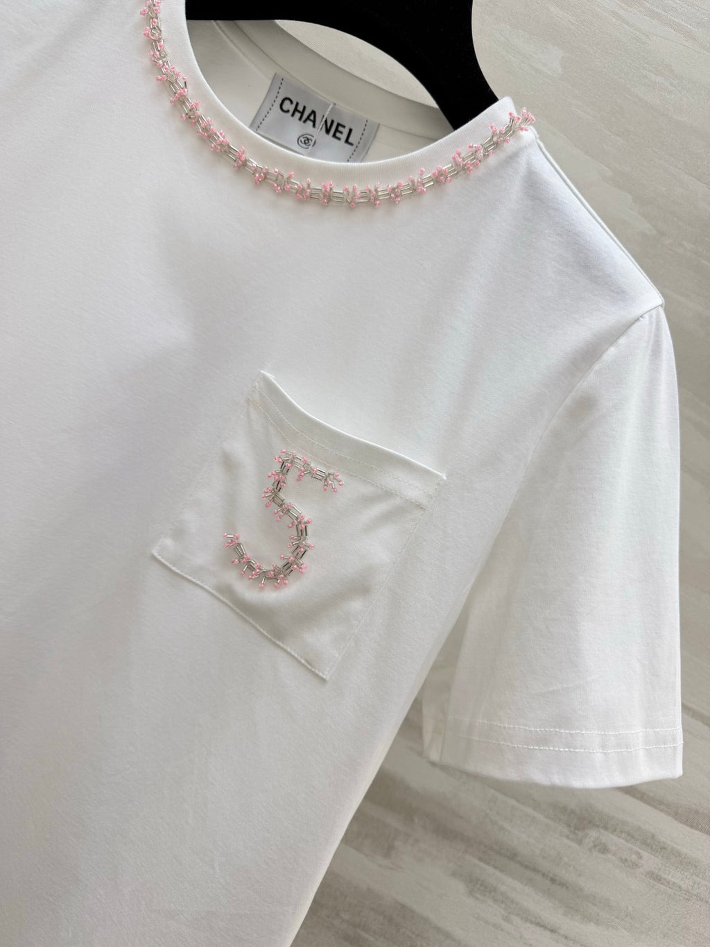 2026 White T-Shirt with Embroidered "5"  Pink rhinestone-beaded neckline—packed with exquisite detail.