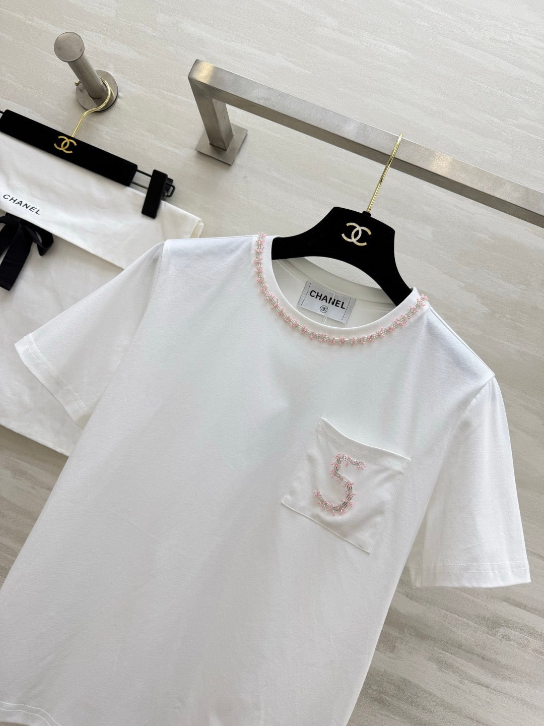 2026 White T-Shirt with Embroidered "5"  Pink rhinestone-beaded neckline—packed with exquisite detail.