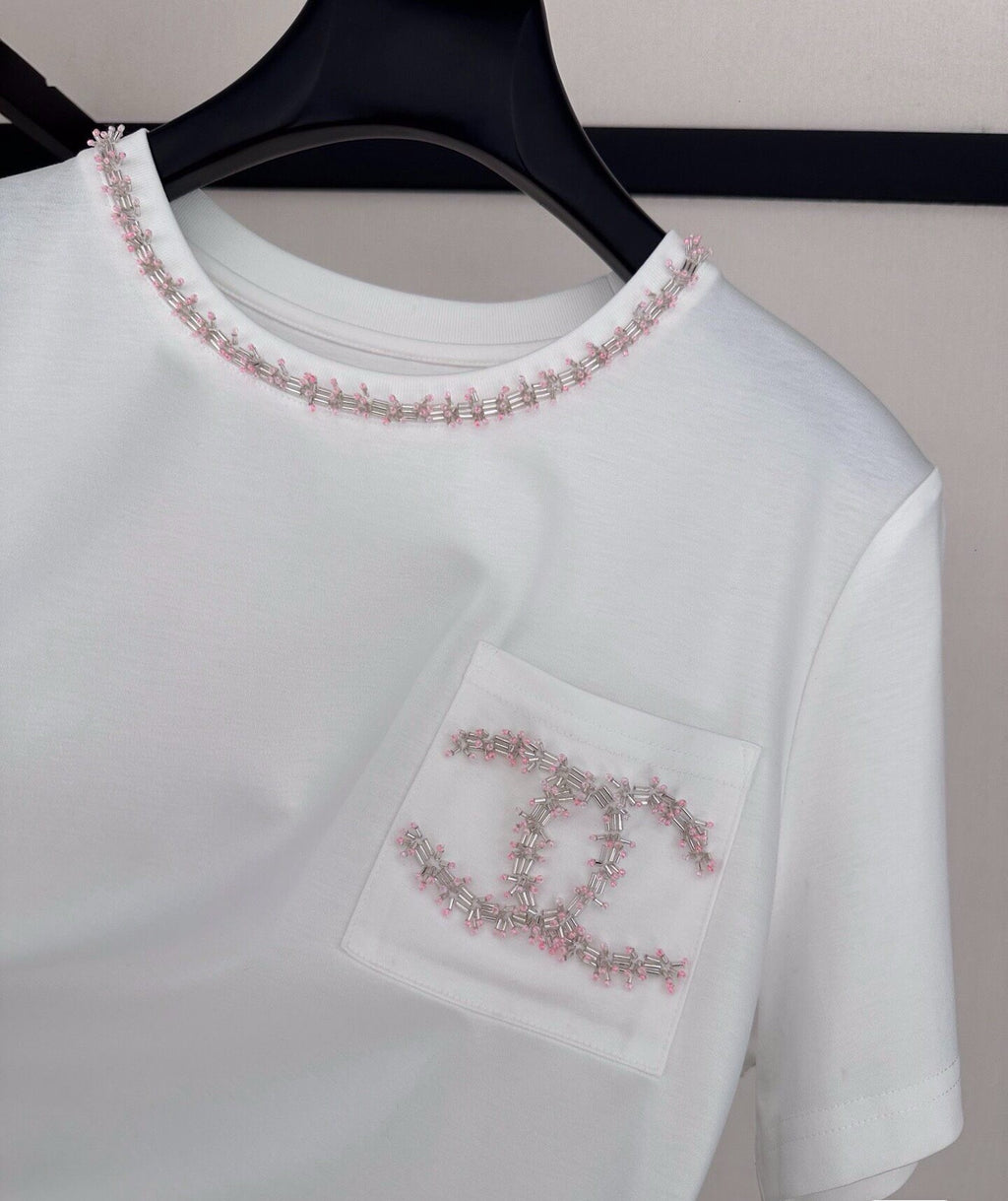 26SS New Pearl-Trimmed Double C Pocket T-Shirt, with light pink pearl and stripe embellishments on the neckline and pockets.