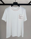26SS New Pearl-Trimmed Double C Pocket T-Shirt, with light pink pearl and stripe embellishments on the neckline and pockets.