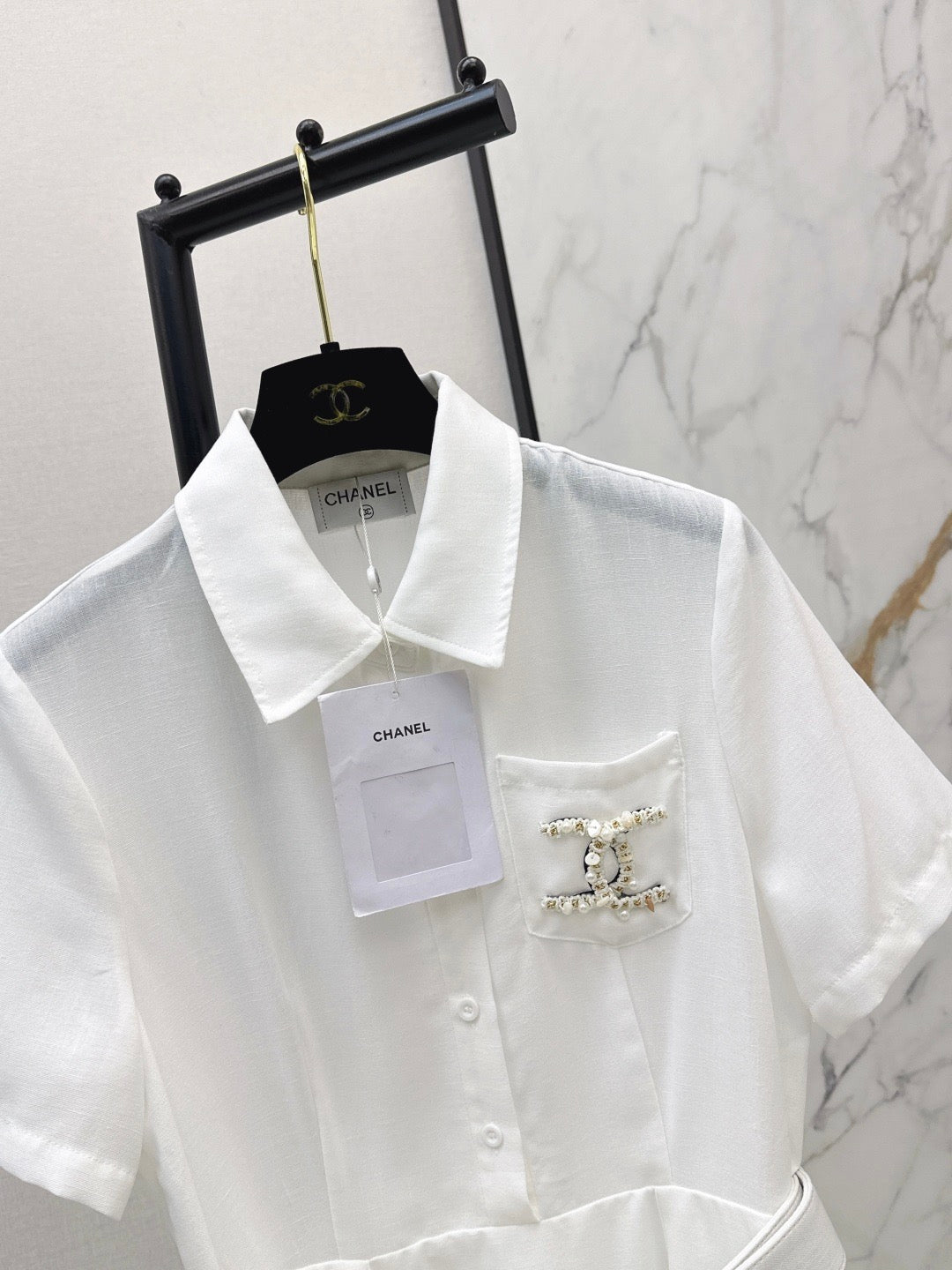26SS — Latest Spring/Summer Collection: Long Dress with Beaded Pocket Embellishment 🤍 Features pearls at the pockets alongside a woven metal Double-C logo.