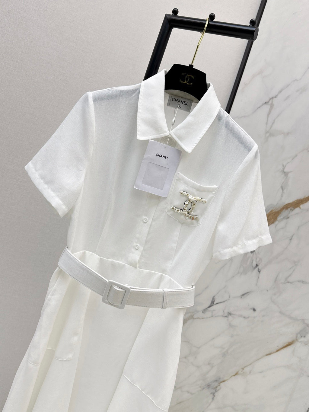 26SS — Latest Spring/Summer Collection: Long Dress with Beaded Pocket Embellishment 🤍 Features pearls at the pockets alongside a woven metal Double-C logo.