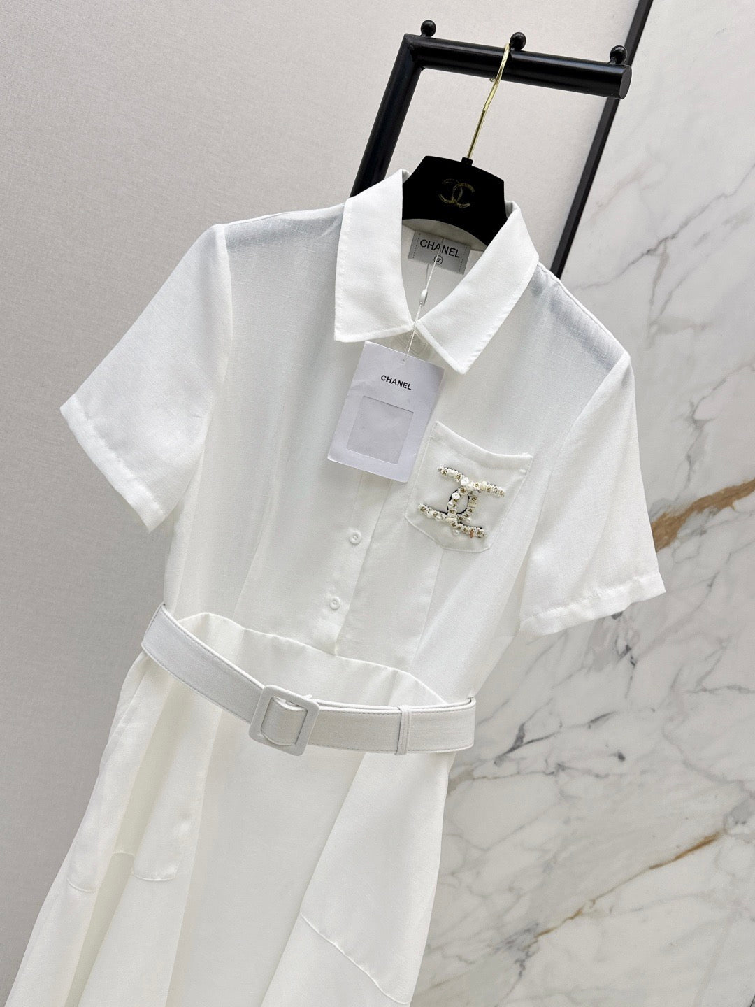26SS — Latest Spring/Summer Collection: Long Dress with Beaded Pocket Embellishment 🤍 Features pearls at the pockets alongside a woven metal Double-C logo.