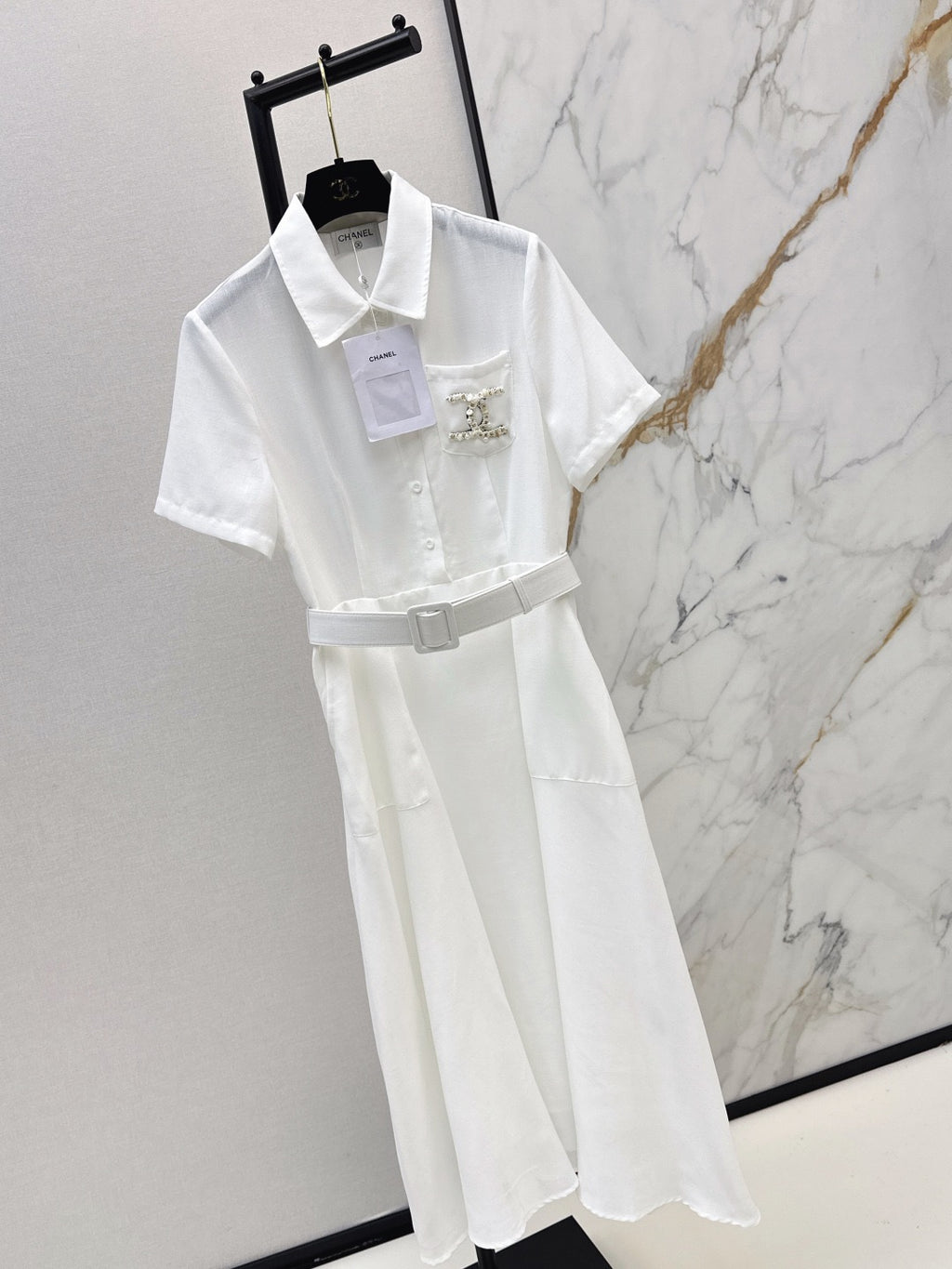 26SS — Latest Spring/Summer Collection: Long Dress with Beaded Pocket Embellishment 🤍 Features pearls at the pockets alongside a woven metal Double-C logo.