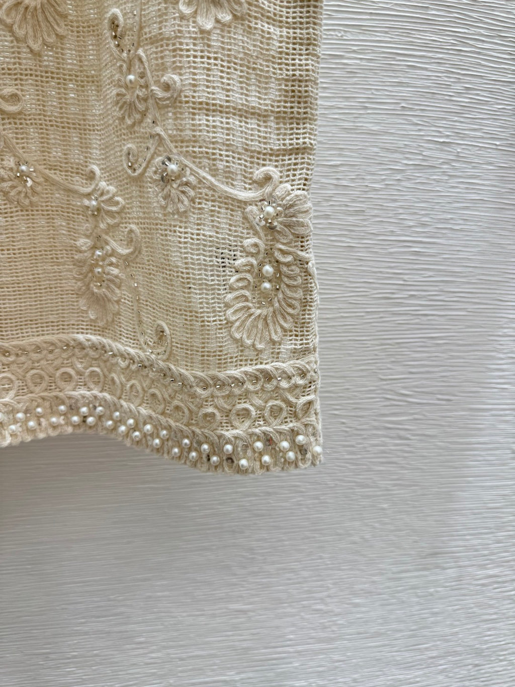 2026 New Arrival: Sleeveless V-Neck Knit Top in Apricot — Featuring Openwork Logo Pattern, Pearl Embroidery, and Single-Breasted Design