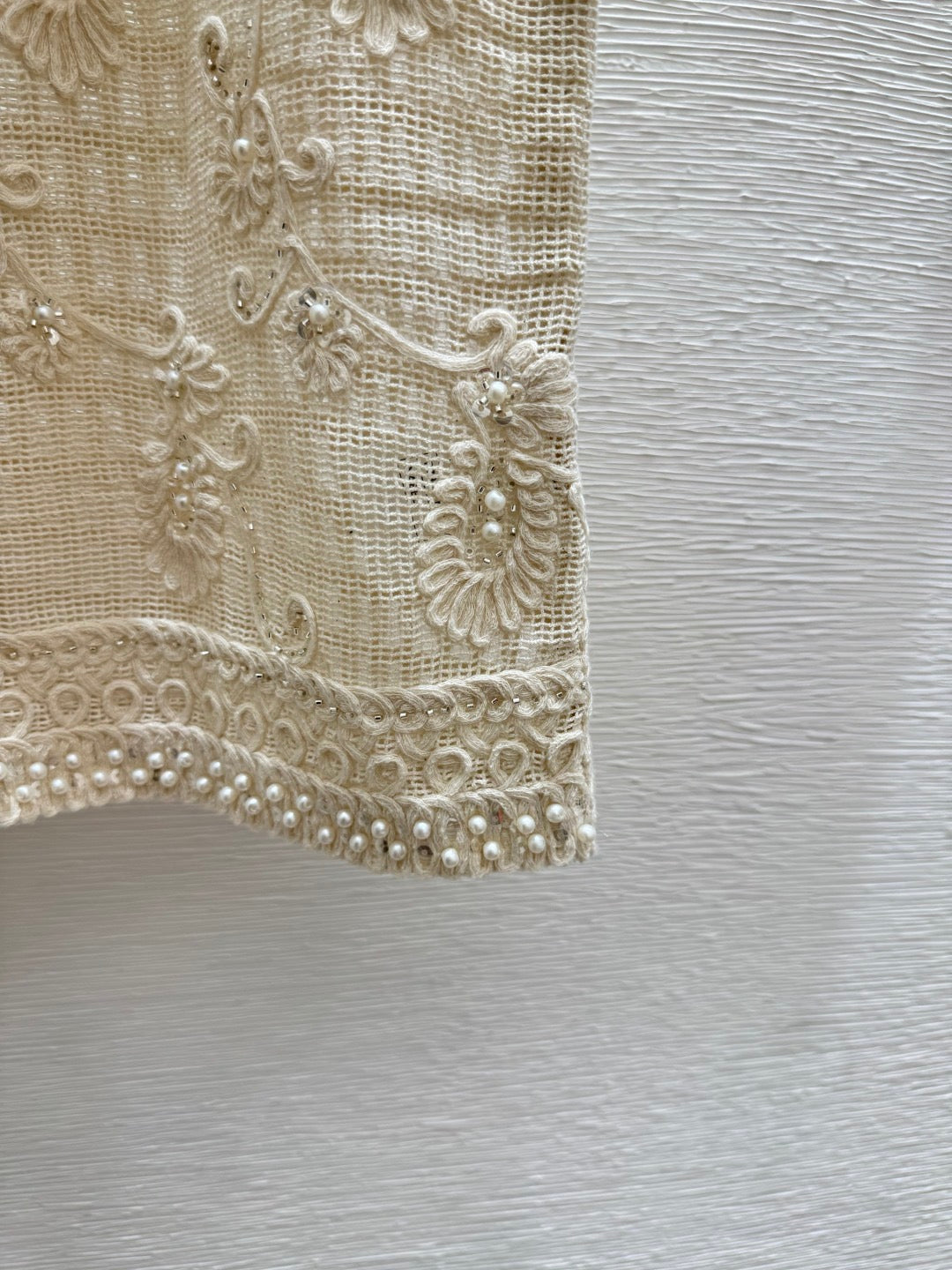 2026 New Arrival: Sleeveless V-Neck Knit Top in Apricot — Featuring Openwork Logo Pattern, Pearl Embroidery, and Single-Breasted Design