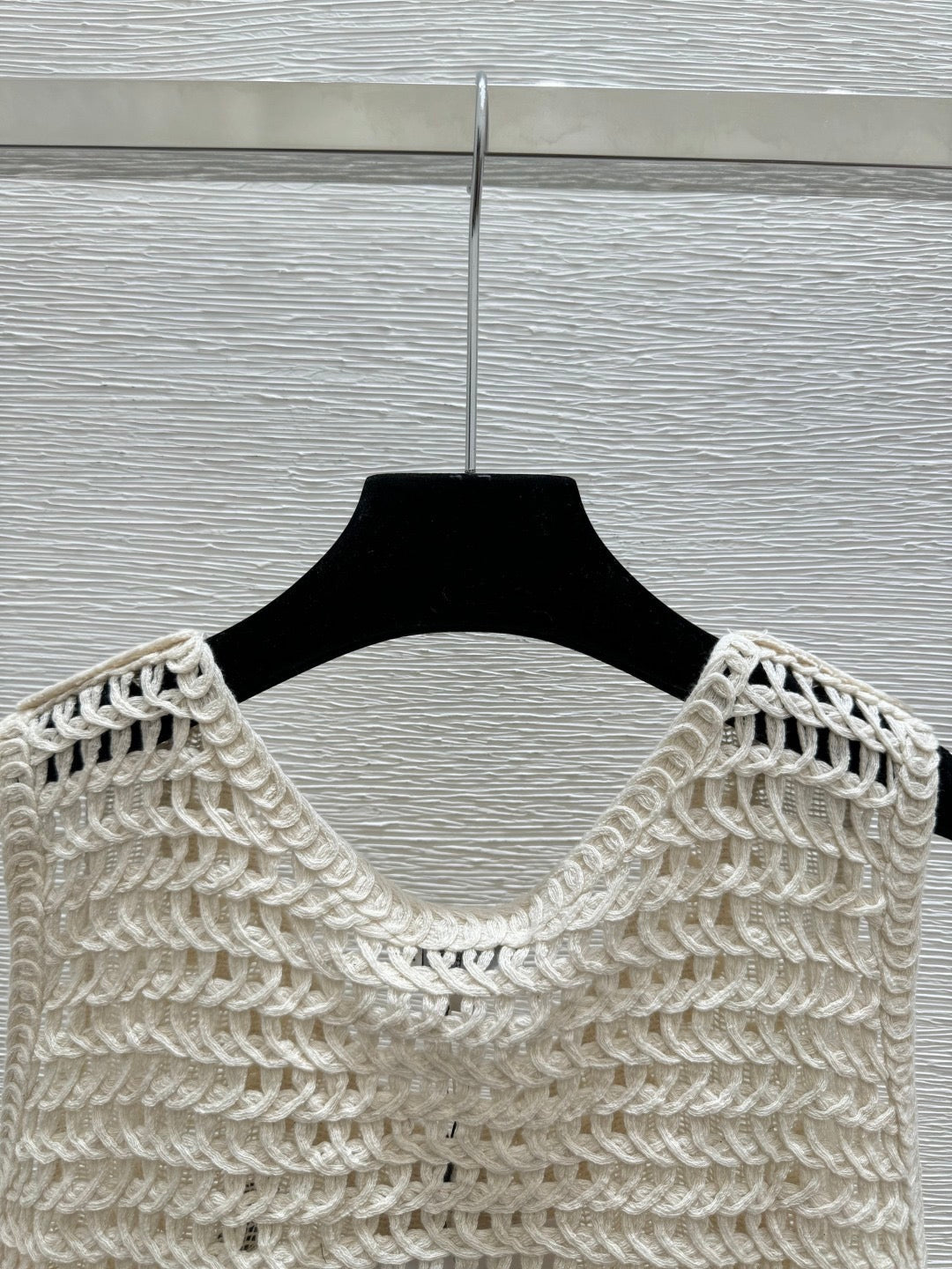 2026 New Arrival: Sleeveless V-Neck Knit Top in Apricot — Featuring Openwork Logo Pattern, Pearl Embroidery, and Single-Breasted Design