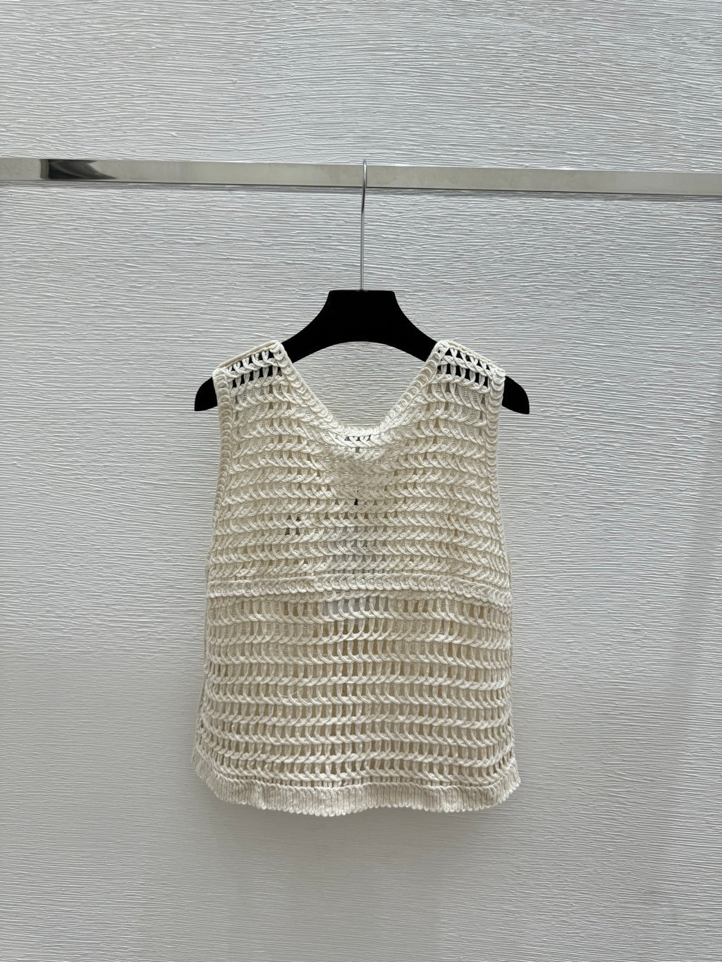 2026 New Arrival: Sleeveless V-Neck Knit Top in Apricot — Featuring Openwork Logo Pattern, Pearl Embroidery, and Single-Breasted Design