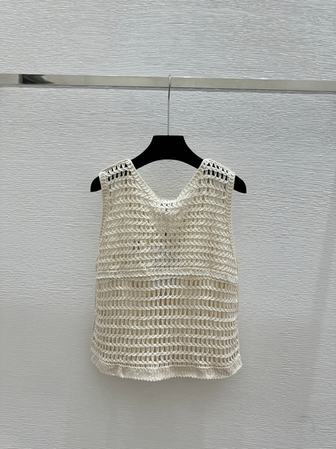 2026 New Arrival: Sleeveless V-Neck Knit Top in Apricot — Featuring Openwork Logo Pattern, Pearl Embroidery, and Single-Breasted Design