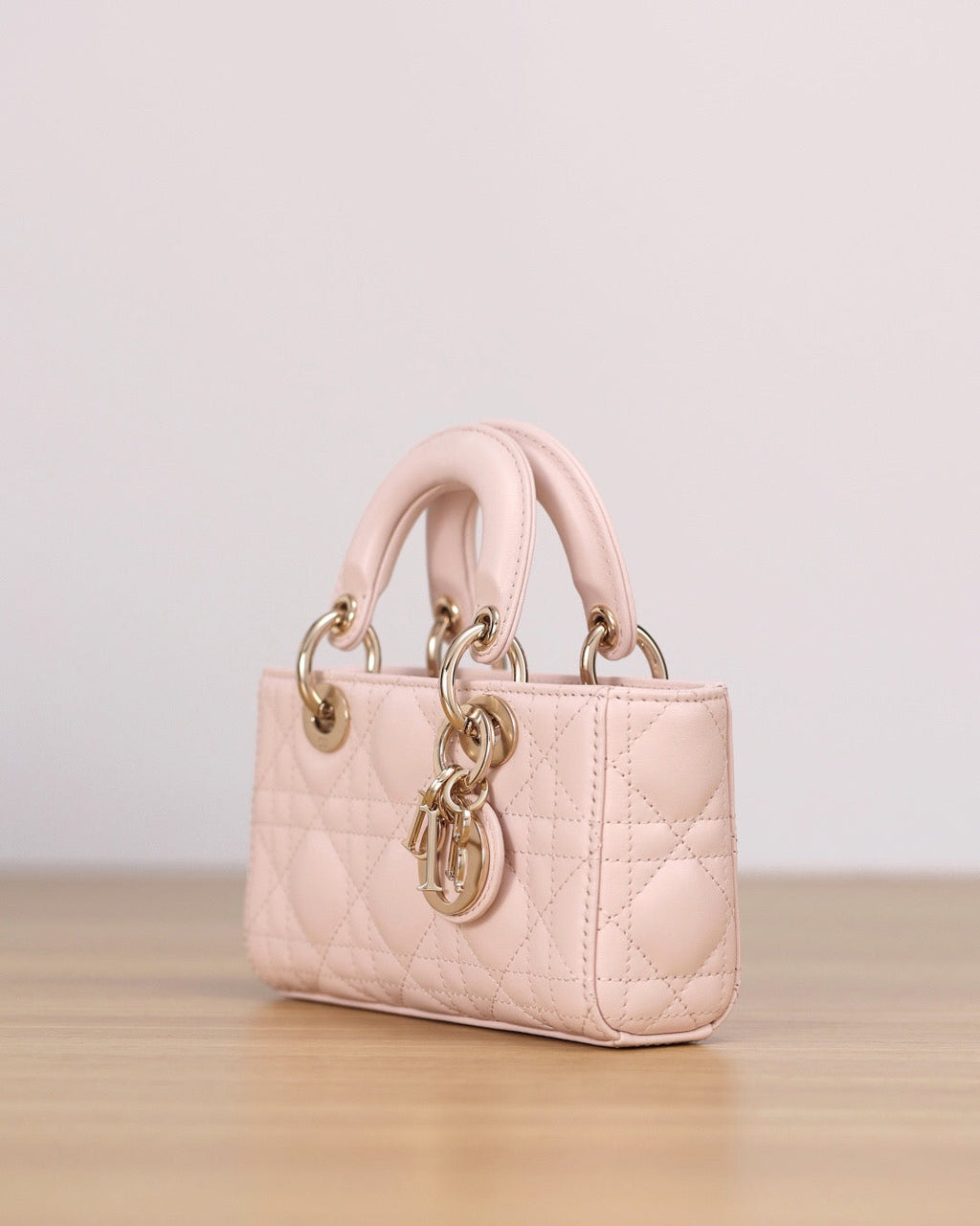 25FW NEW Pink Woven Leather Handbag
