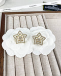 New diamond-studded resin earrings and matching necklace